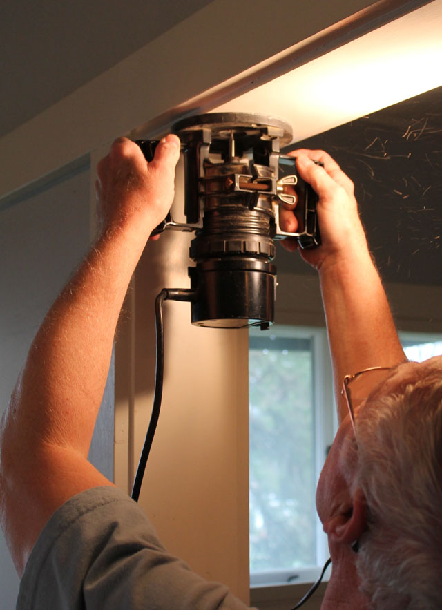 using the router to embed the hardware in the doorway