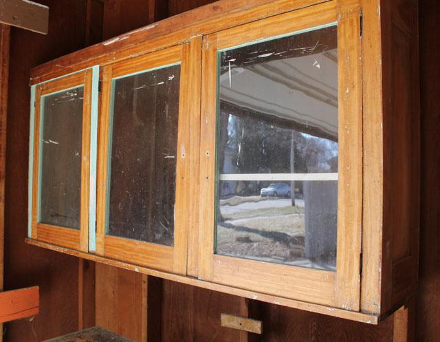 the glass doors on the original cabinetry in our American System-Built home