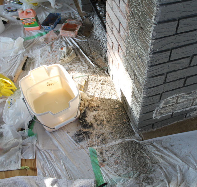 The mess of stripping the fireplace