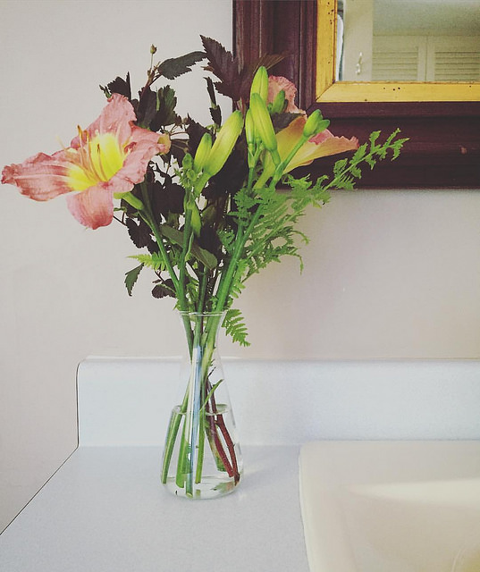 A bouquet of wildflowers in the bathroom