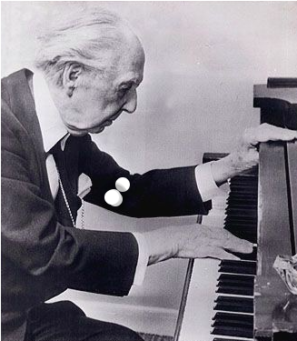 Frank Lloyd Wright at the piano in 1955